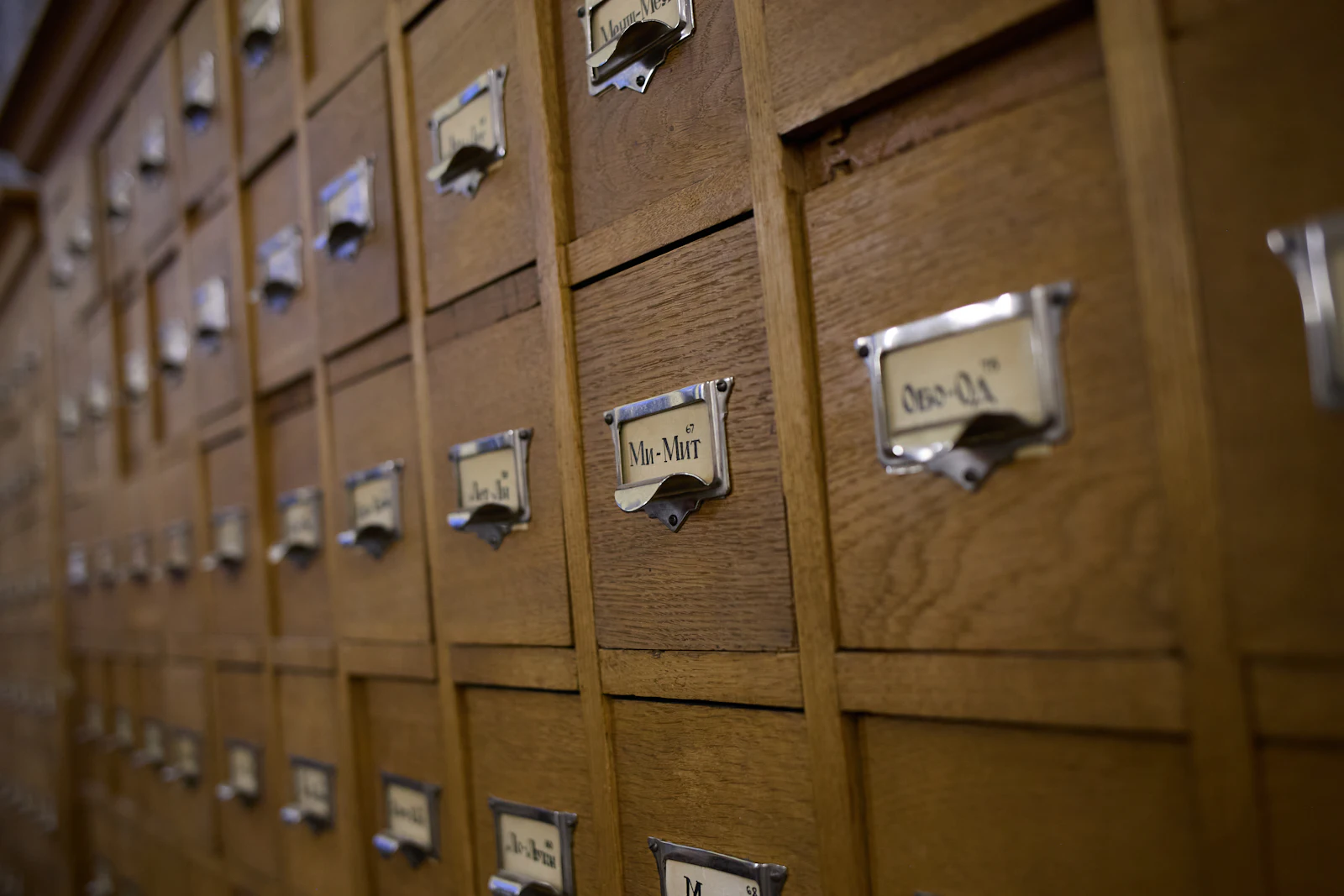 Wooden card catalog drawers with metal label holders
